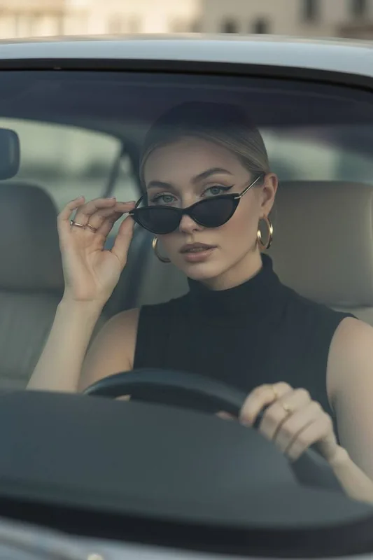Use the user's appearance 1:1 — face, skin, hair, and body without any changes. Close-up portrait from passenger seat PO
